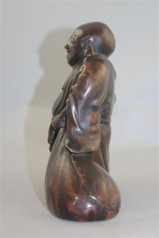 A Japanese bronze standing figure of Hotei, 19th century, 19cm